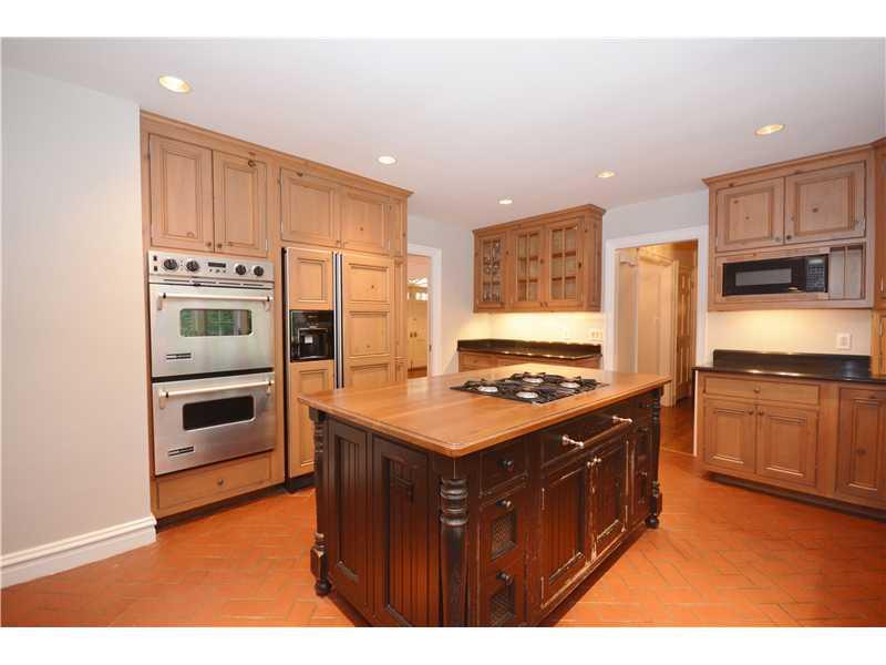 133 Riding Trail Lane Fox Chapel, PA 15215 - Photo 10 of 25 Kitchen. Wall to floor built-in cabinetry, door to dining area and also family room access.