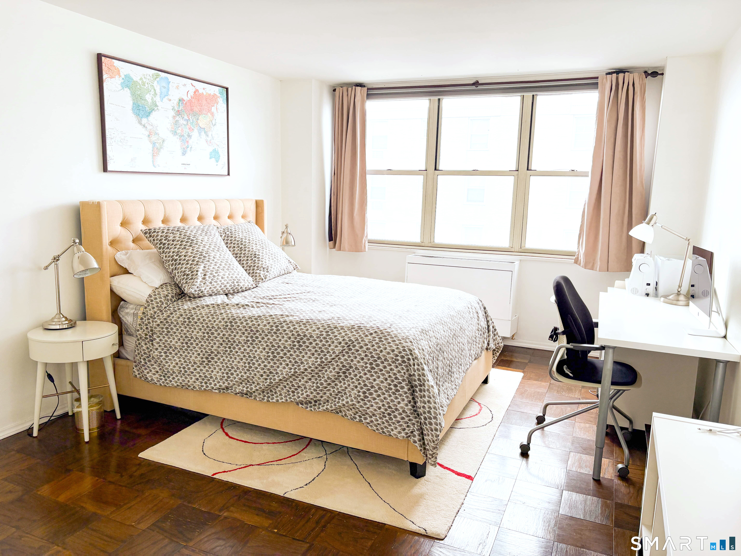 50 Glenbrook Road, Unit 9C Stamford, CT 06902 - Photo 6 of 20 a bedroom with a bed and wooden floor