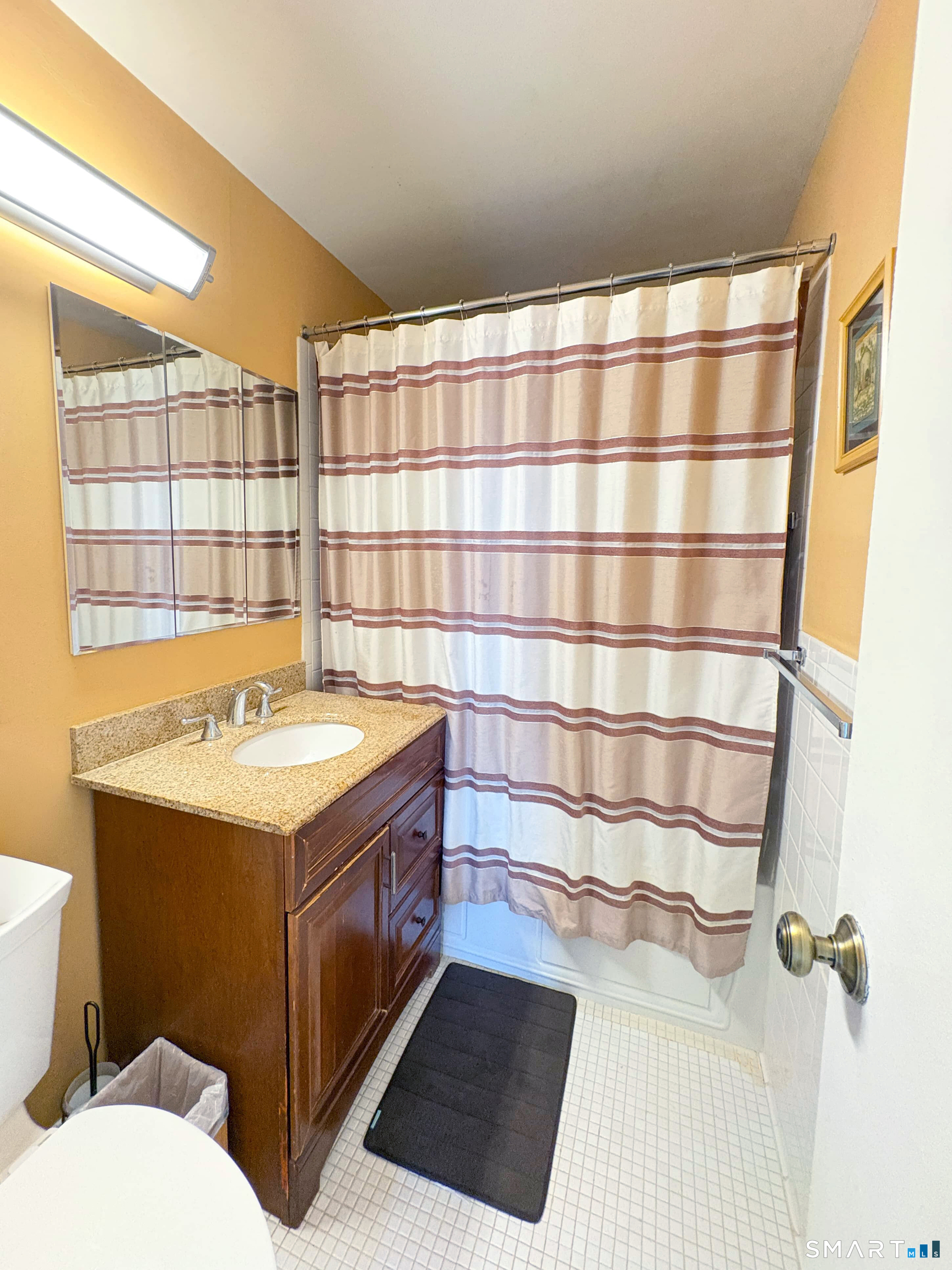 50 Glenbrook Road, Unit 9C Stamford, CT 06902 - Photo 8 of 20 a bathroom with a sink and a shower
