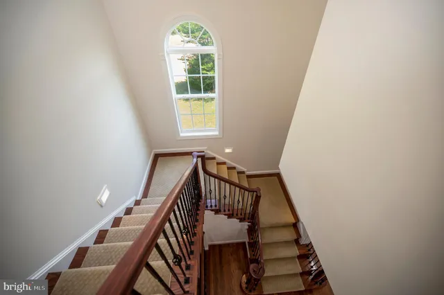 a spacious bathroom with a sink double vanity and a large mirror