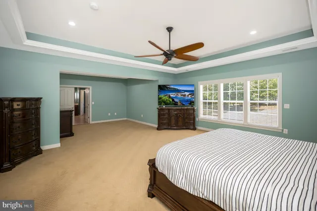 a kitchen with stainless steel appliances a sink and cabinets