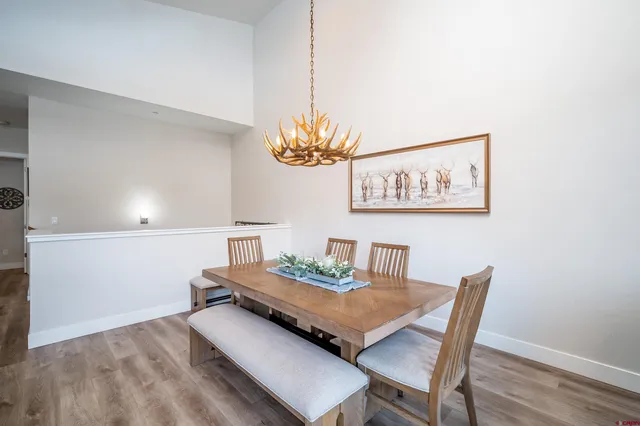 a view of a dining room with furniture