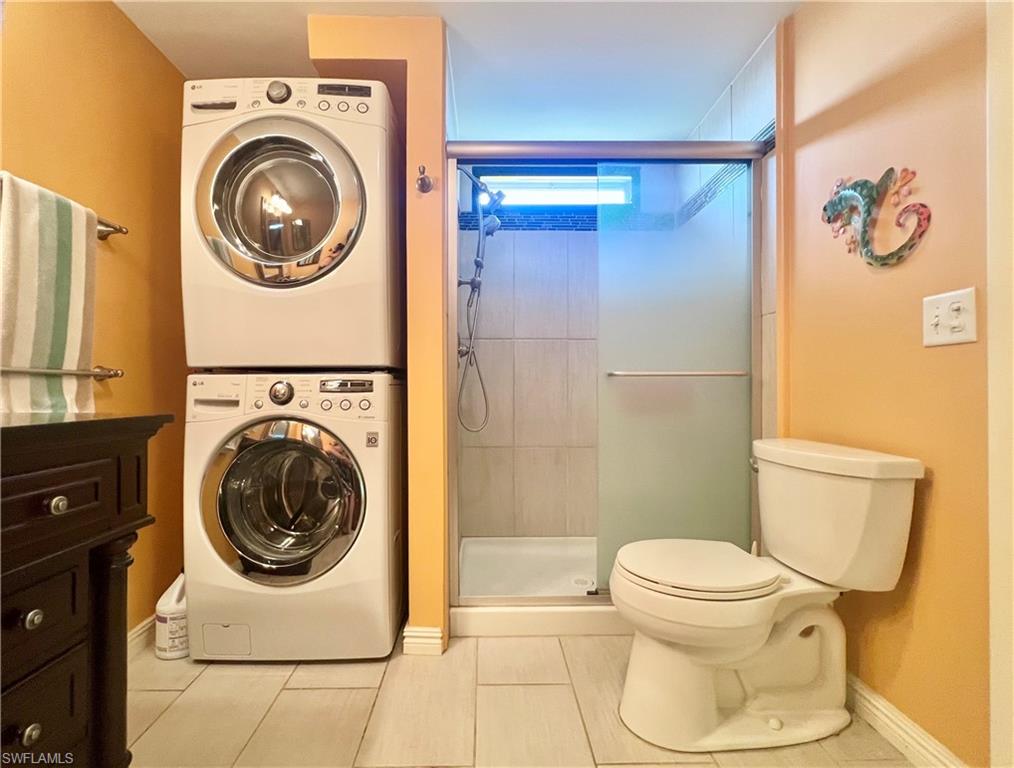 273 Cape Sable Drive Naples, FL 34104 - Photo 17 of 49 a utility room with dryer and washer