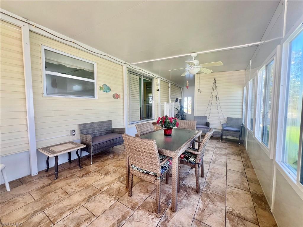 273 Cape Sable Drive Naples, FL 34104 - Photo 26 of 49 a view of a dining room with furniture
