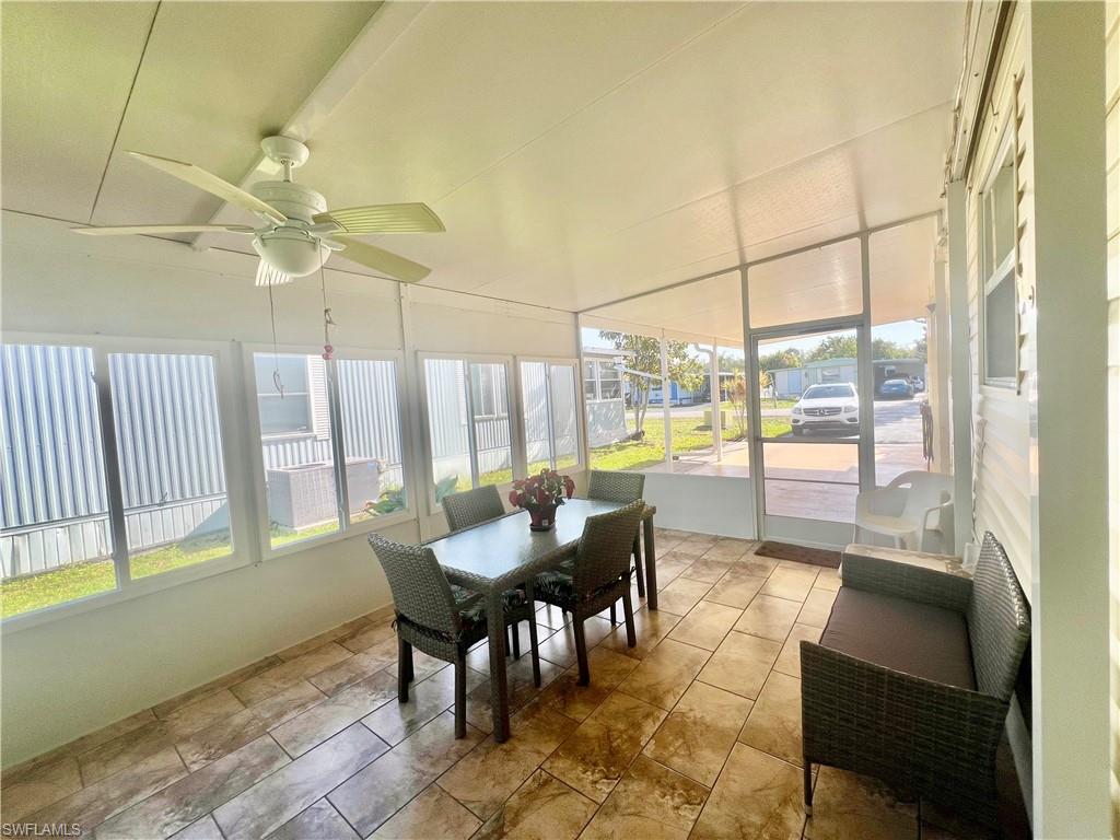 273 Cape Sable Drive Naples, FL 34104 - Photo 27 of 49 a view of a dining room with furniture window and outside view