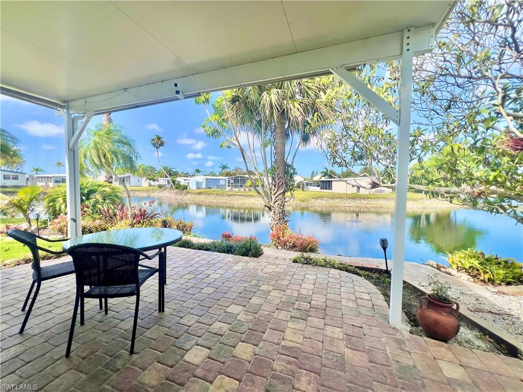 273 Cape Sable Drive Naples, FL 34104 - Photo 33 of 49 a outdoor space with chairs