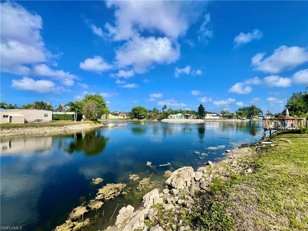 273 Cape Sable Drive Naples, FL 34104 - Photo 35 of 49 a view of a lake with outdoor space