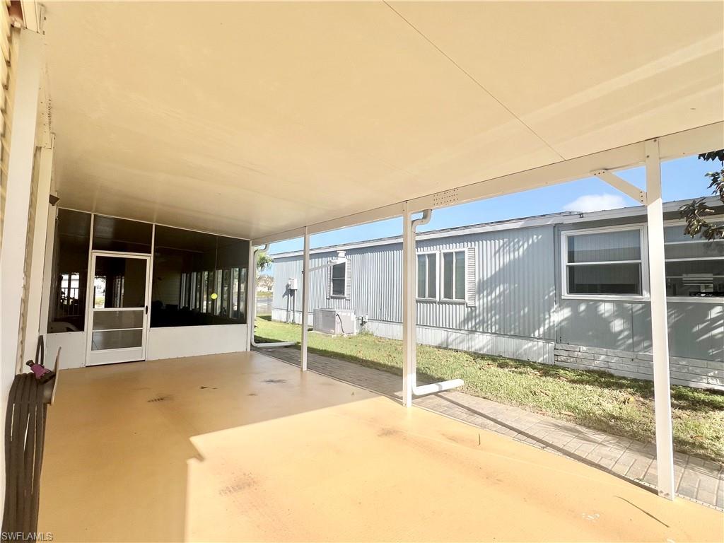 273 Cape Sable Drive Naples, FL 34104 - Photo 41 of 49 a house view with a outdoor space