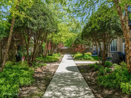 a view of of pathway with a yard