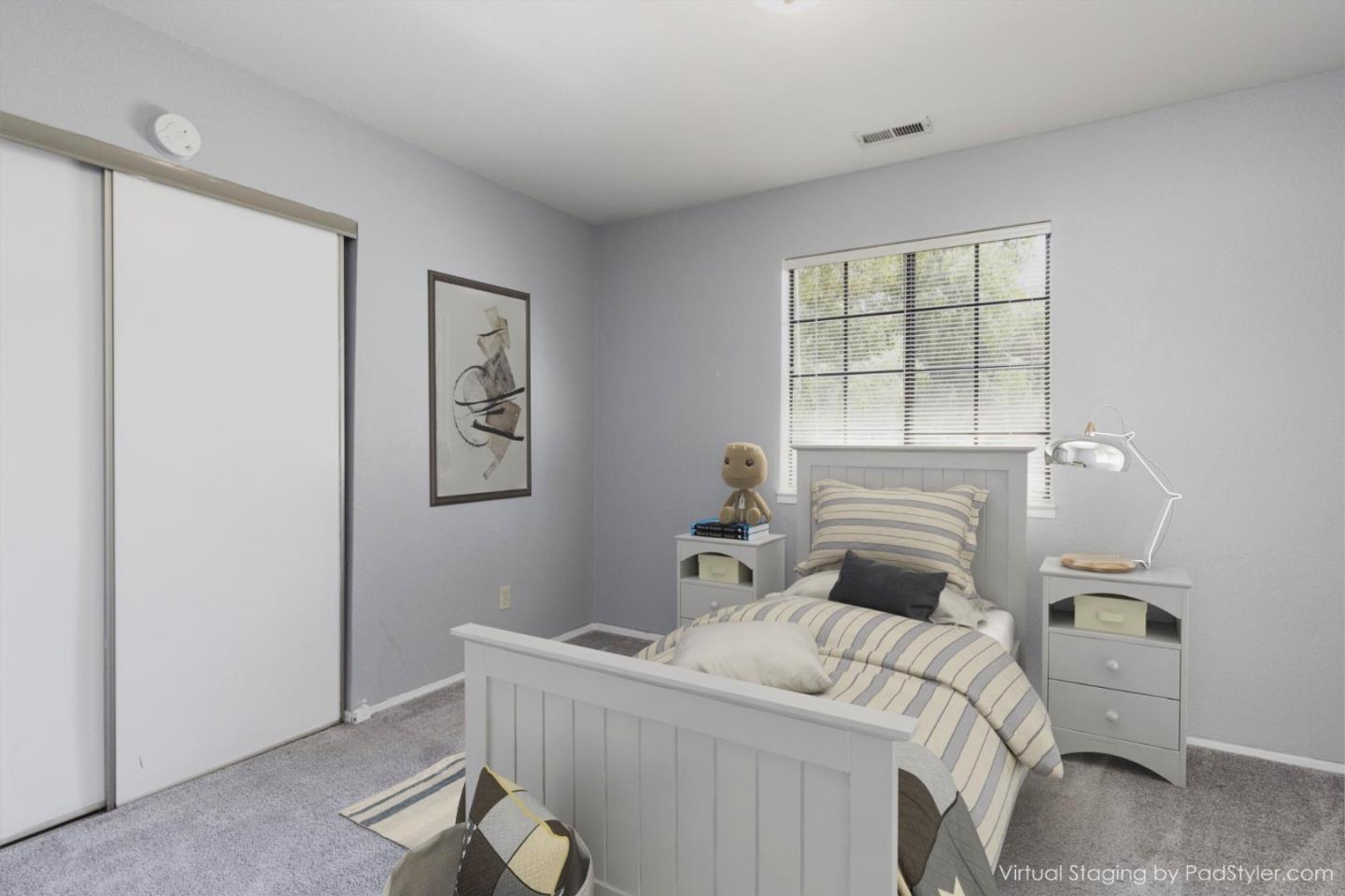 1061 Olympic Lane Seaside, CA 93955 - Photo 12 of 24 a bed room with a bed and a window