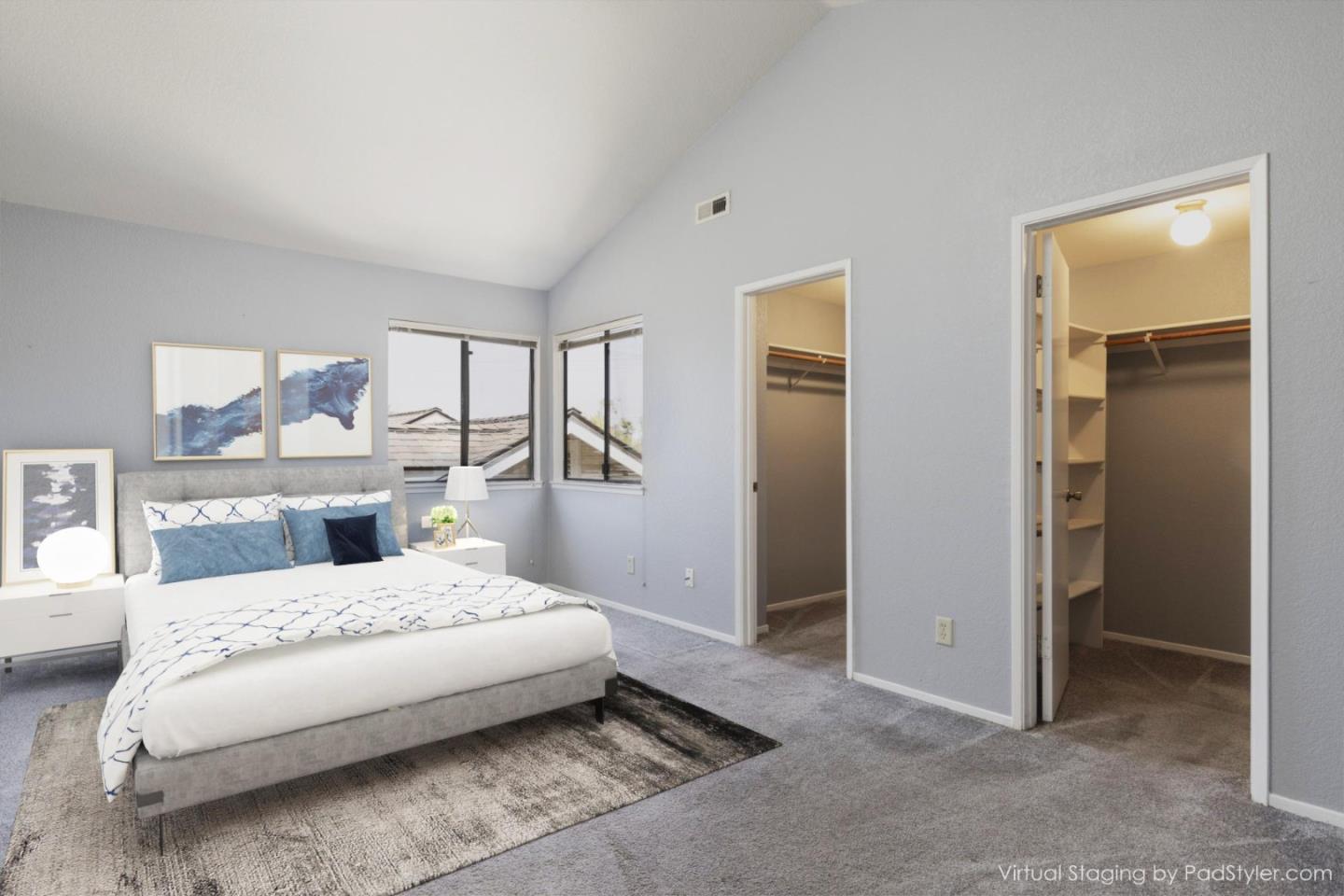 1061 Olympic Lane Seaside, CA 93955 - Photo 16 of 24 a bedroom with a bed and a painting on the wall