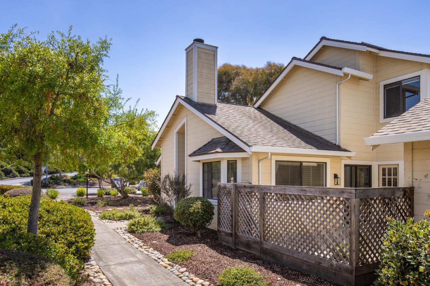 1061 Olympic Lane Seaside, CA 93955 - Photo 19 of 24 a view of a house with wooden fence