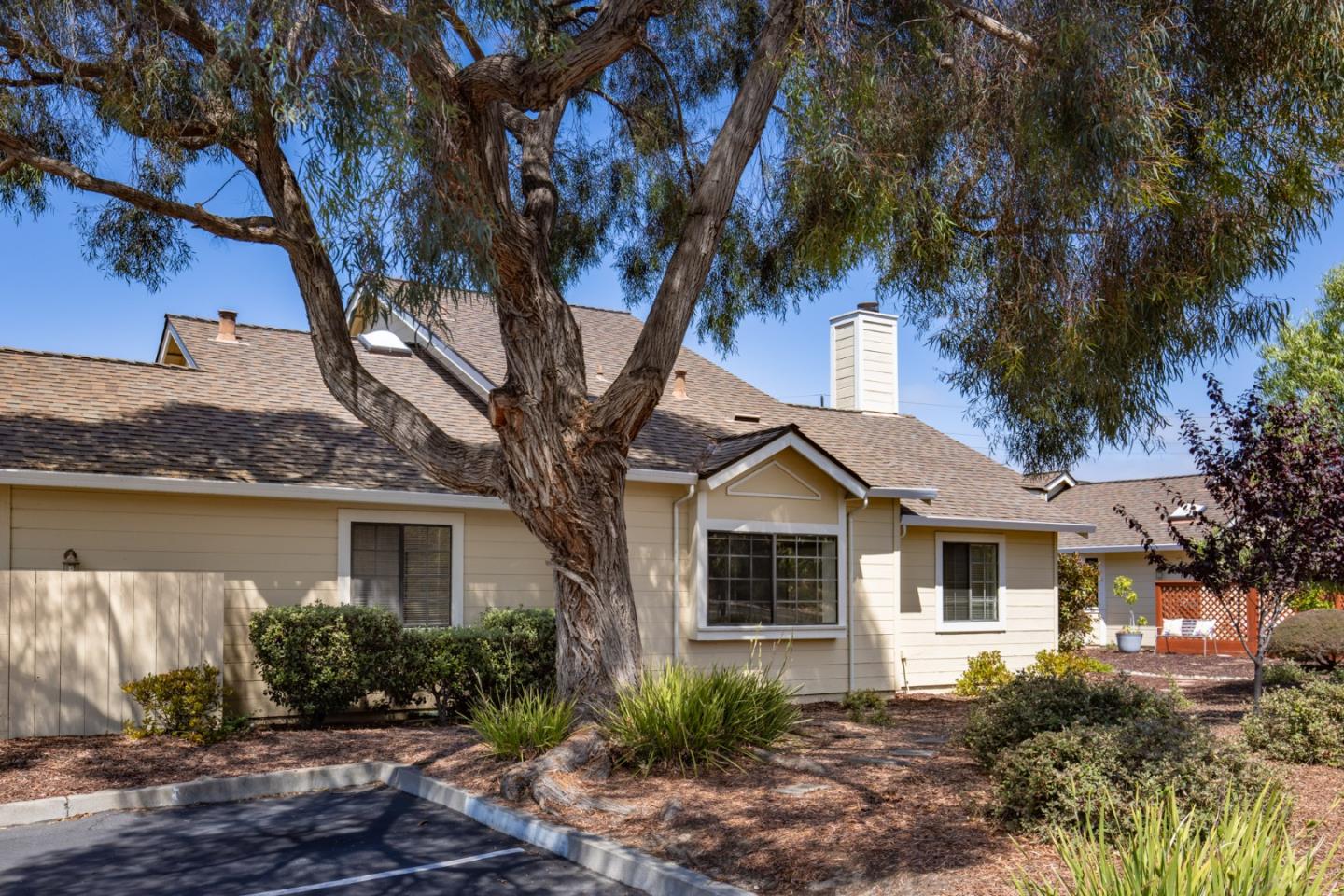 1061 Olympic Lane Seaside, CA 93955 - Photo 22 of 24 a front view of a house with garden