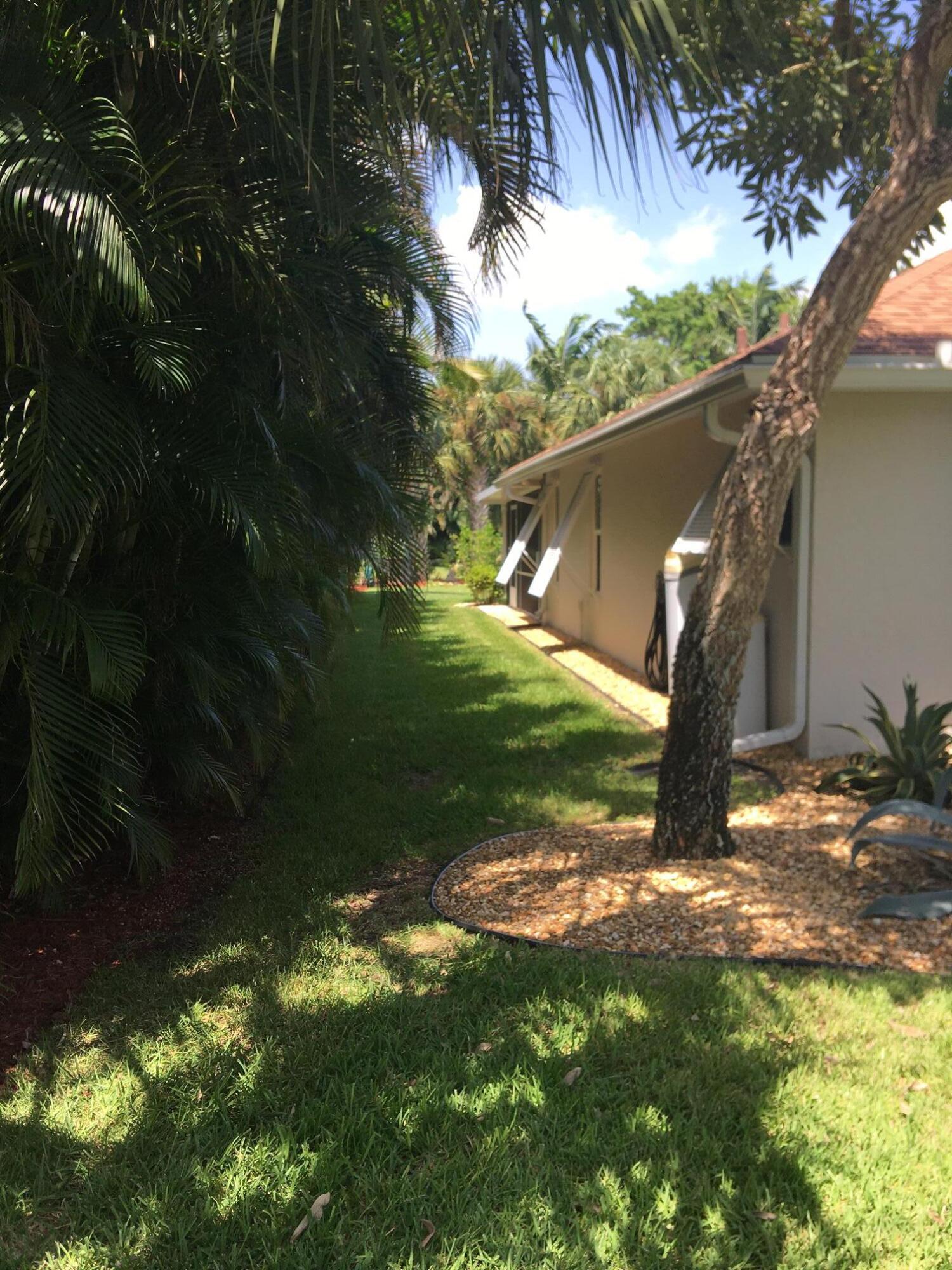 5597 Southeast Major Way Stuart, FL 34997 - Photo 42 of 53 West Side