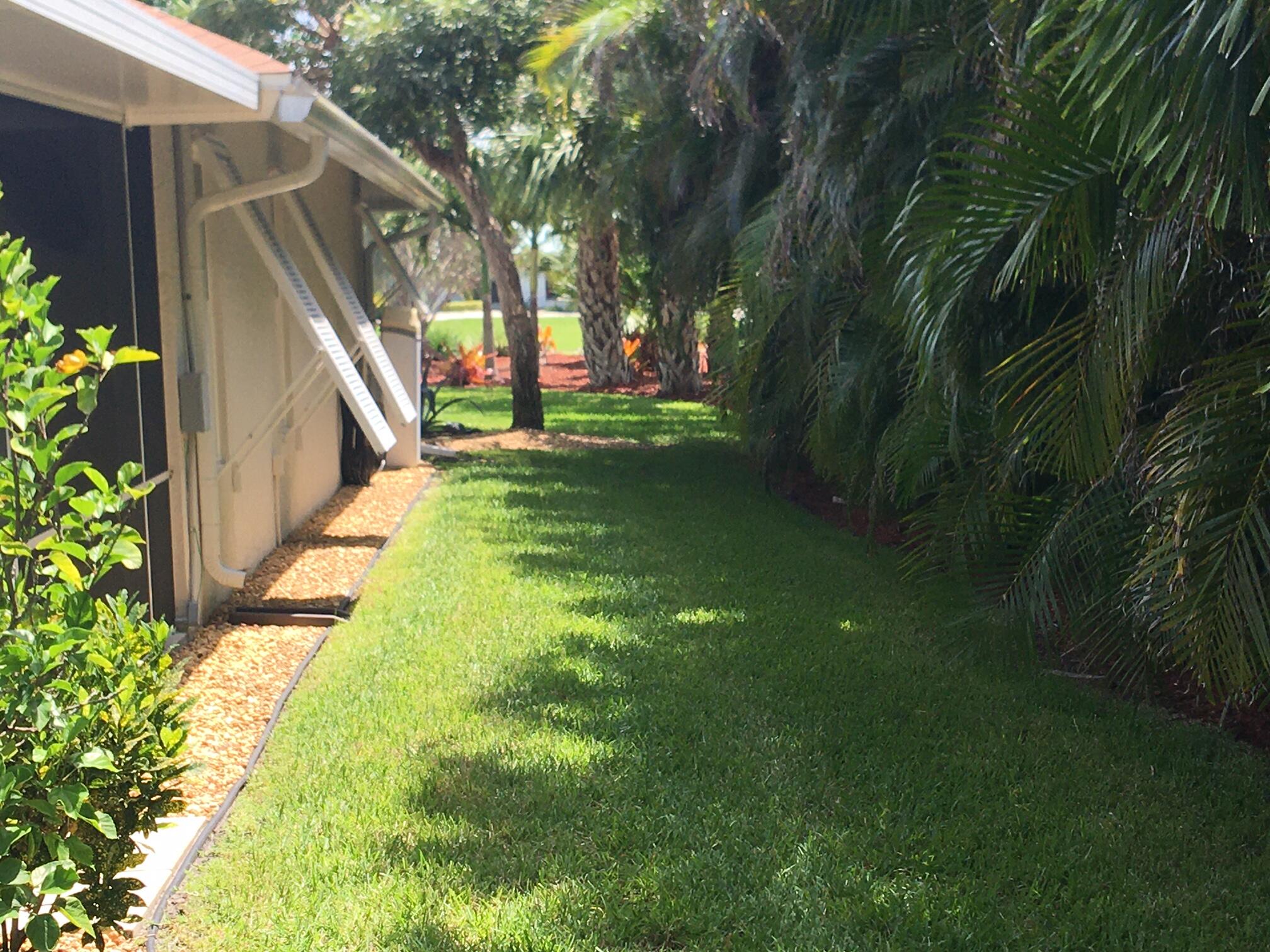 5597 Southeast Major Way Stuart, FL 34997 - Photo 45 of 53 West View from Rear Yard