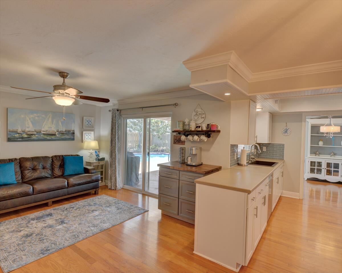 365 Kingston Road Satellite Beach, FL 32937 - Photo 14 of 31 a kitchen that has a lot of cabinets in it
