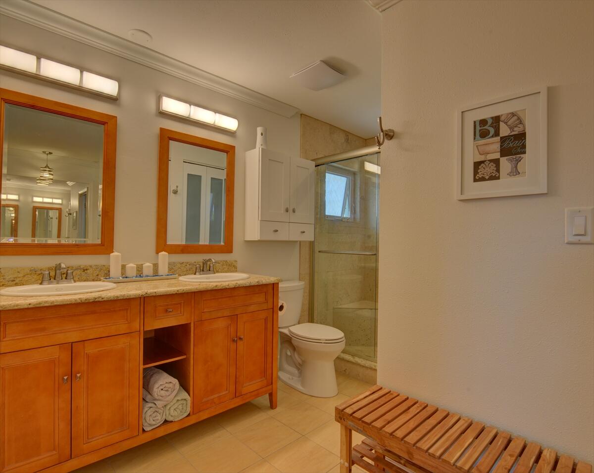 365 Kingston Road Satellite Beach, FL 32937 - Photo 19 of 31 a bathroom with a sink and a mirror