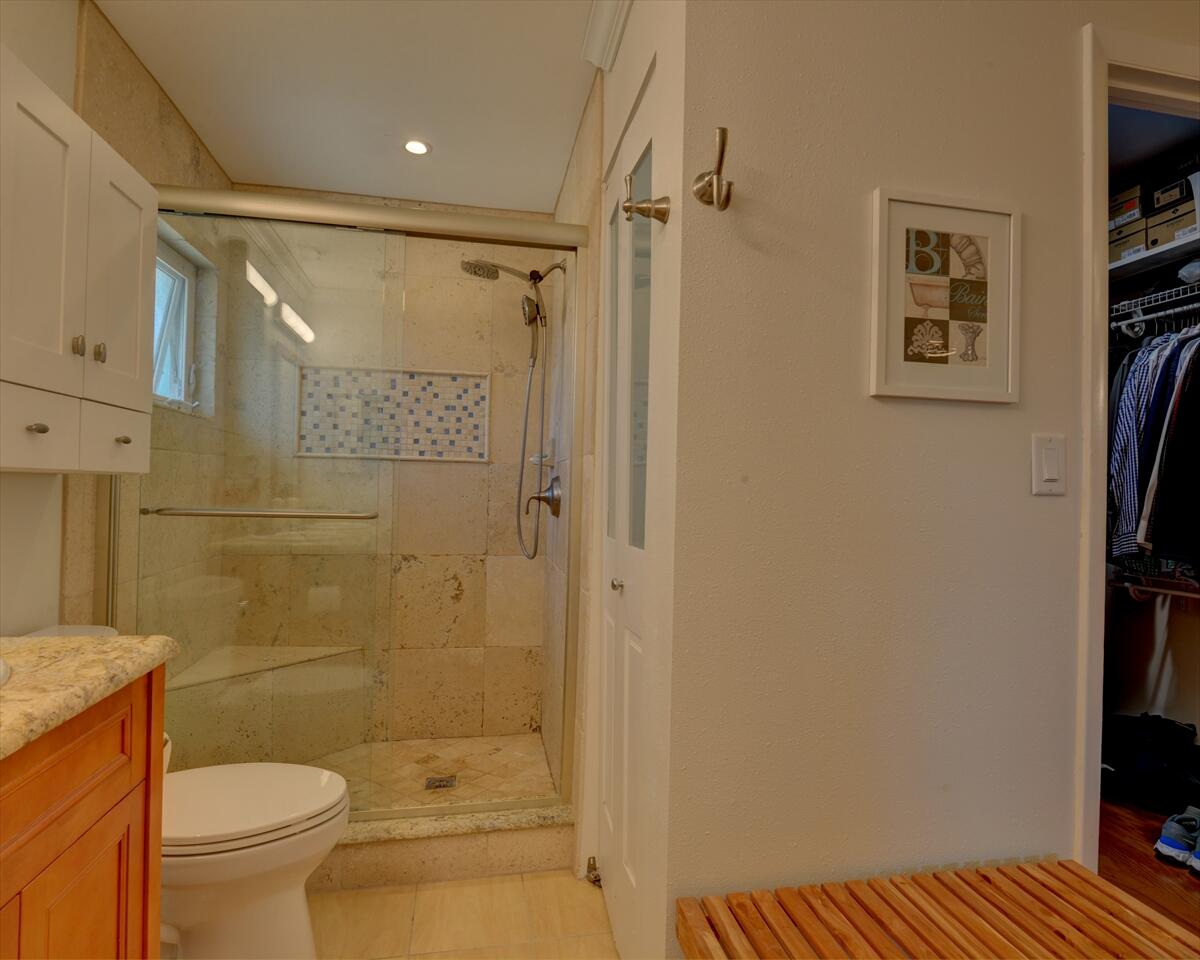 365 Kingston Road Satellite Beach, FL 32937 - Photo 20 of 31 a bathroom with a shower and a toilet