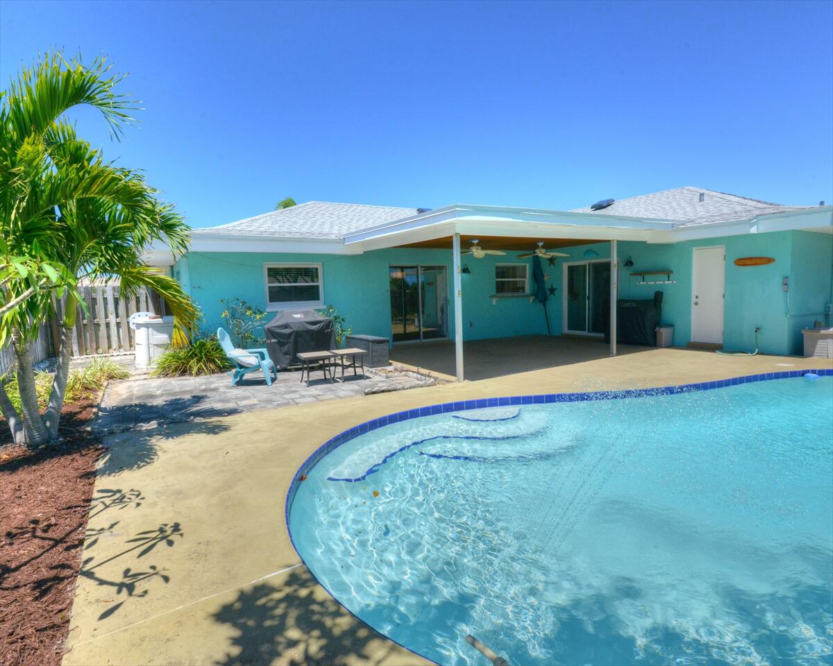 365 Kingston Road Satellite Beach, FL 32937 - Photo 30 of 31 a view of a house with swimming pool and porch