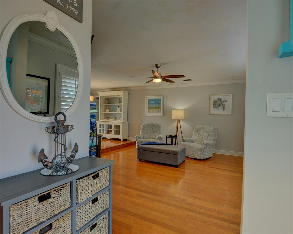 365 Kingston Road Satellite Beach, FL 32937 - Photo 3 of 31 a living room with furniture and wooden floor