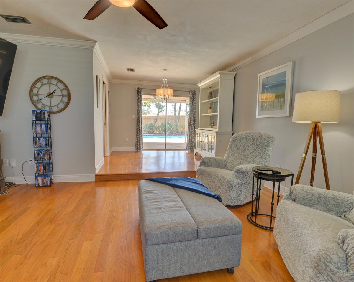 365 Kingston Road Satellite Beach, FL 32937 - Photo 7 of 31 a living room with furniture a window and a lamp