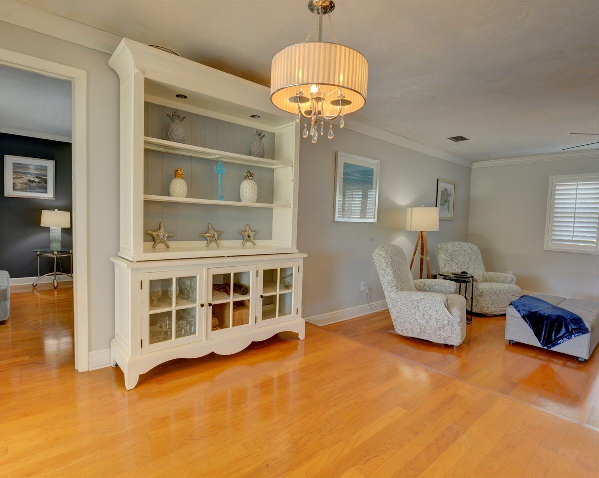 365 Kingston Road Satellite Beach, FL 32937 - Photo 9 of 31 a living room with furniture and a chandelier