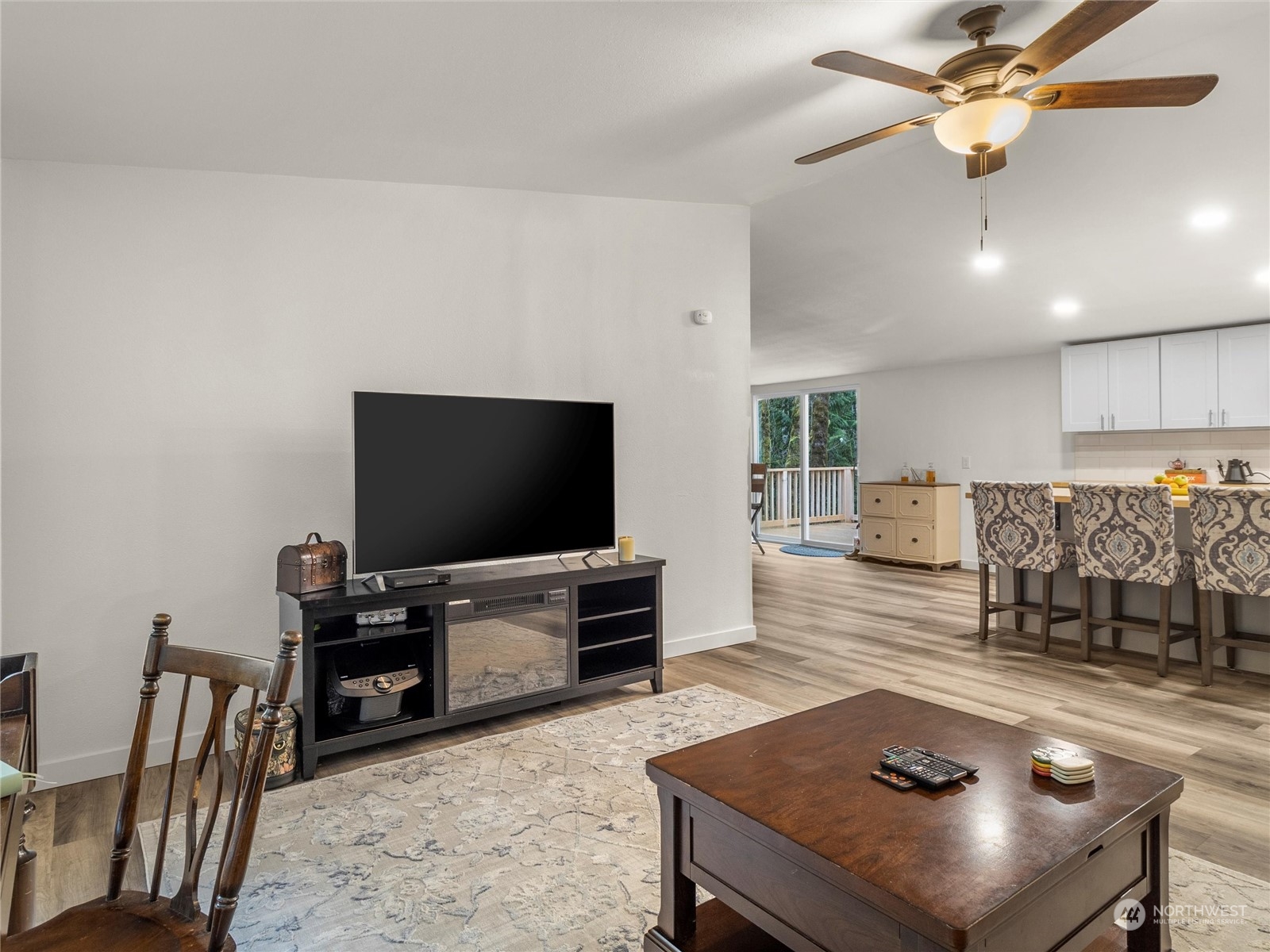 1400 West Deegan Road West Shelton, WA 98584 - Photo 11 of 40 a living room with furniture and a flat screen tv