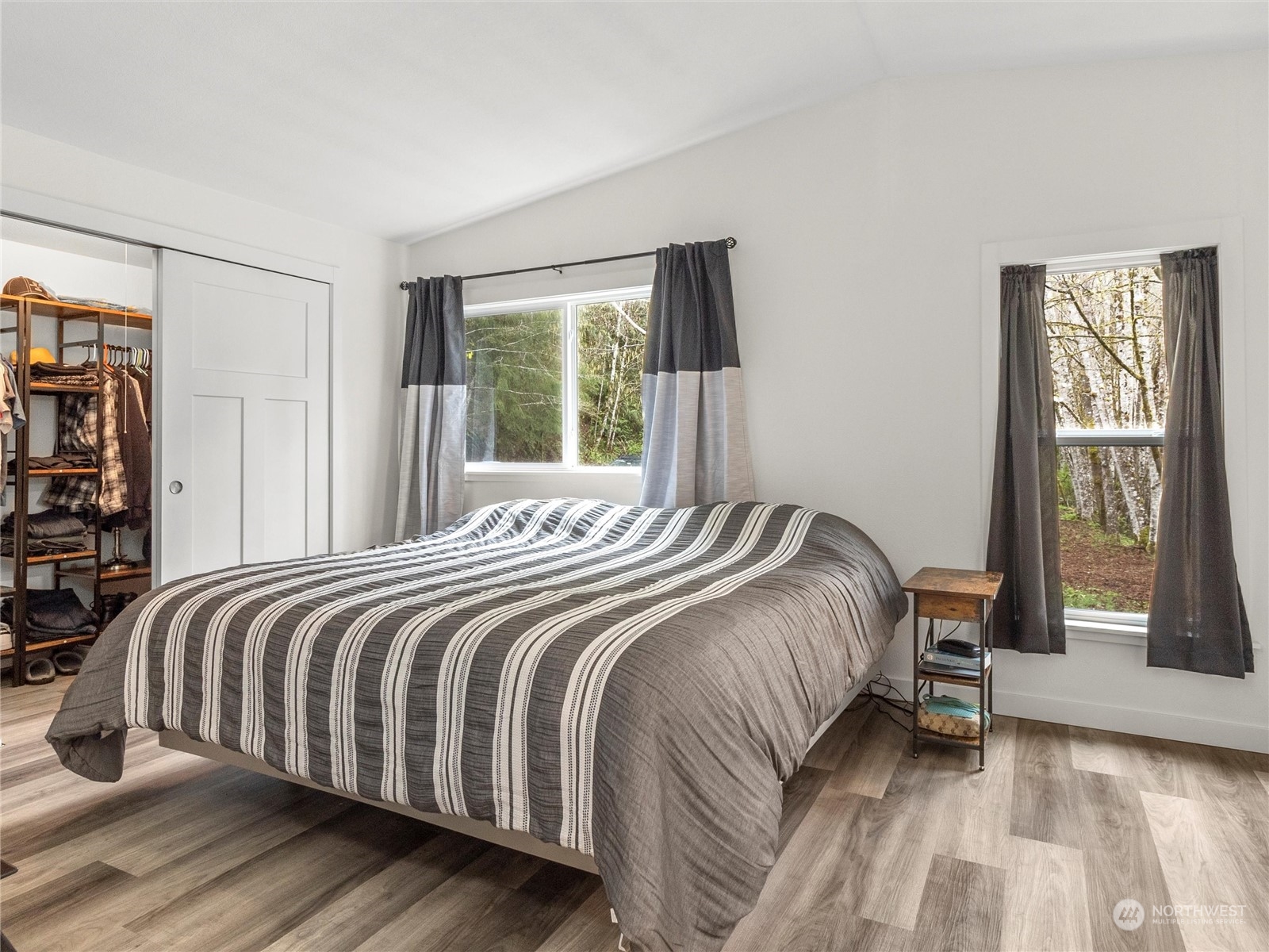 1400 West Deegan Road West Shelton, WA 98584 - Photo 16 of 40 a bedroom with a bed and large window