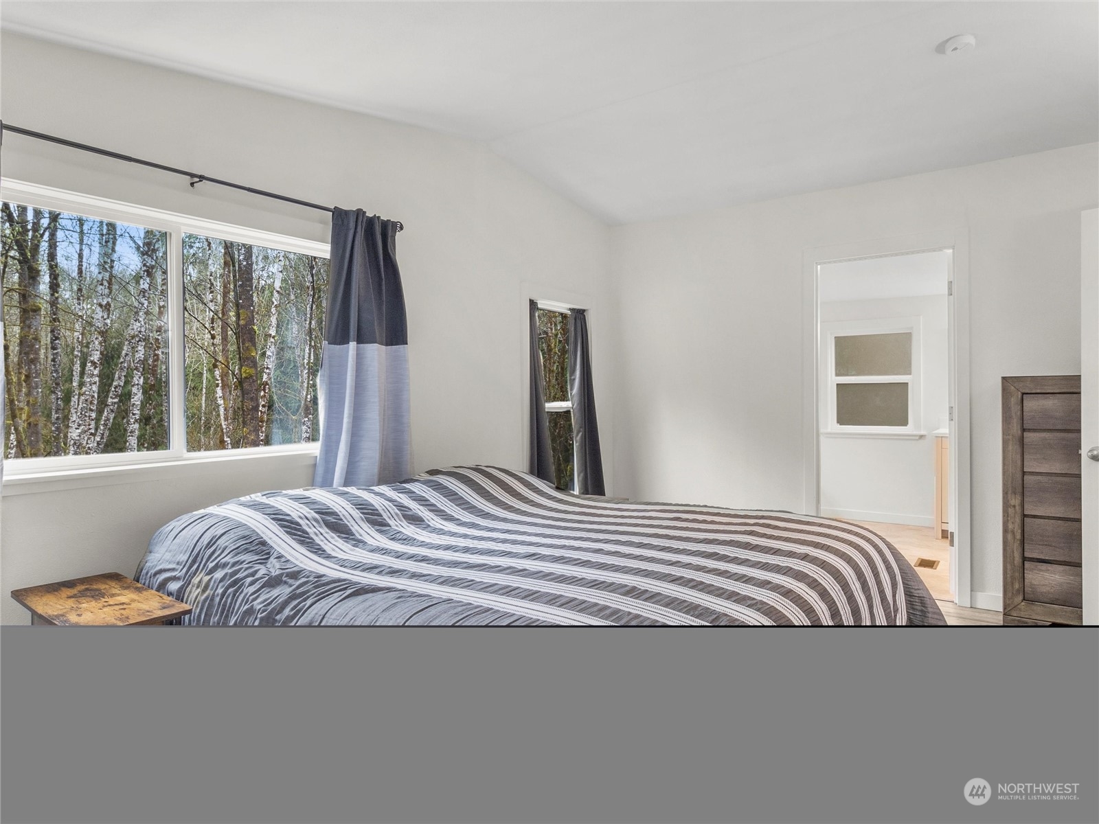 1400 West Deegan Road West Shelton, WA 98584 - Photo 17 of 40 a bedroom with a bed and window