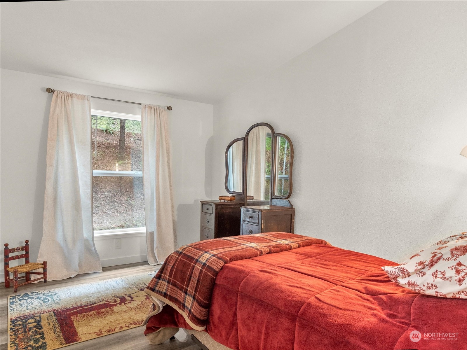 1400 West Deegan Road West Shelton, WA 98584 - Photo 21 of 40 a bedroom with a bed and a window with outer view