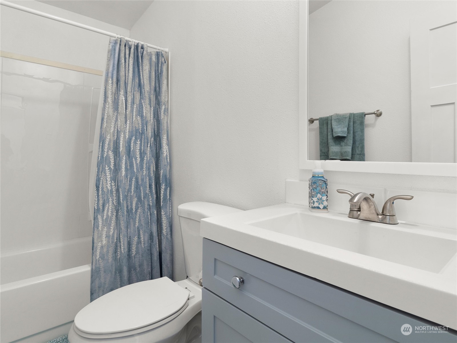 1400 West Deegan Road West Shelton, WA 98584 - Photo 26 of 40 a bathroom with a sink a toilet and shower