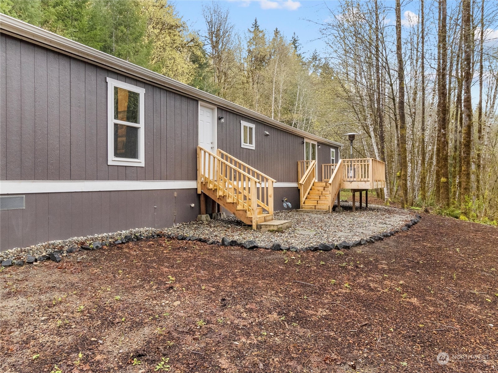 1400 West Deegan Road West Shelton, WA 98584 - Photo 32 of 40 a view of a house with a yard
