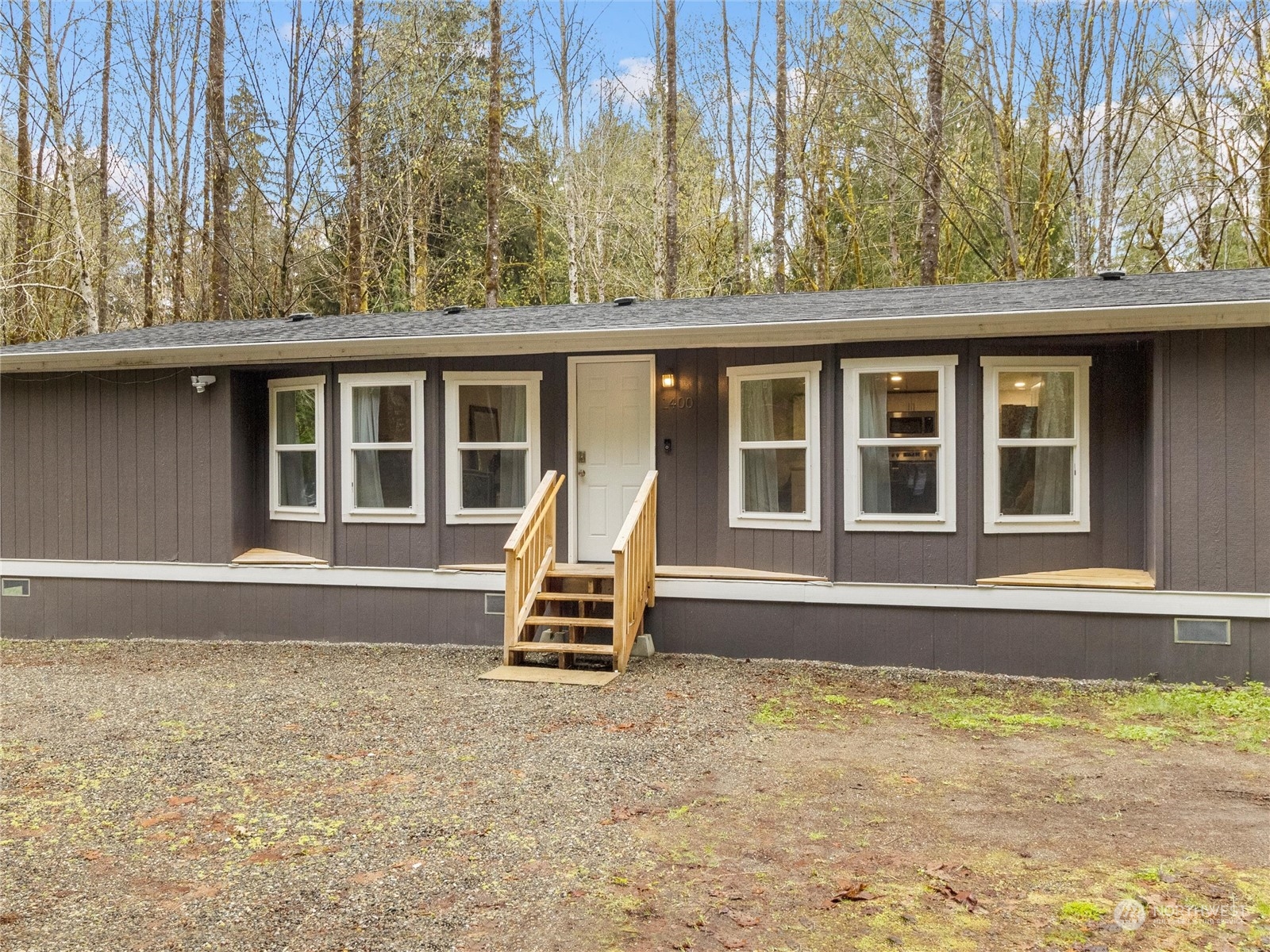 1400 West Deegan Road West Shelton, WA 98584 - Photo 33 of 40 a front view of a house with garden
