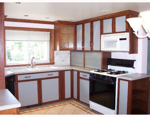 339 Taffy Run Road Rochester, PA 15074 - Photo 4 of 12 Kitchen. Custom Kitchen W/Crown Molding, Lighted Cabinetry, Ceramic Floor & Back Splash