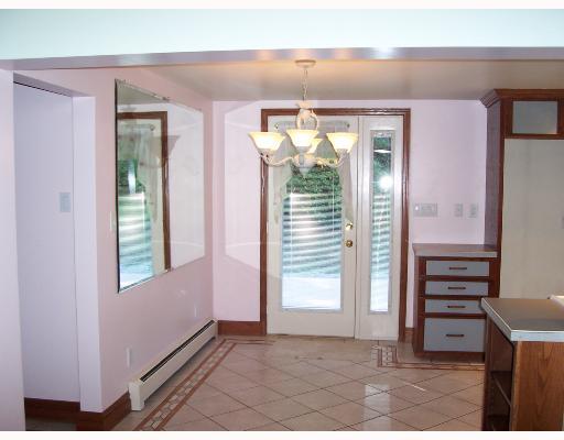339 Taffy Run Road Rochester, PA 15074 - Photo 5 of 12 Dining Room. Easy Care Ceramic Flooring - Full View Door with Deck Access