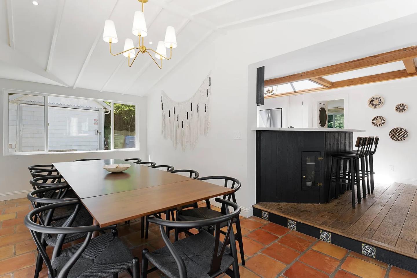 1003 Laurel Glen Road Soquel, CA 95073 - Photo 23 of 101 a view of a dining room with furniture and chandelier