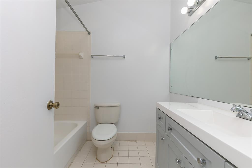 159 Hidden Ct Road, Unit I49 Hollywood, FL 33023 - Photo 12 of 21 a bathroom with a sink a toilet and shower