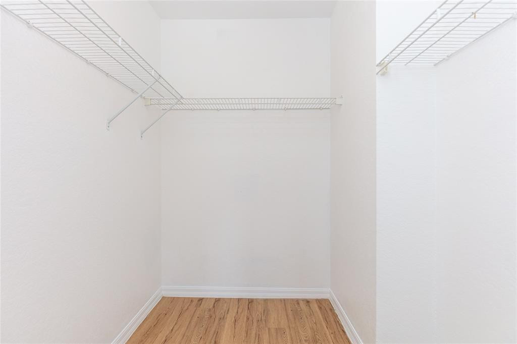 159 Hidden Ct Road, Unit I49 Hollywood, FL 33023 - Photo 21 of 21 a view of a room with racks on the wall