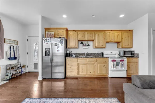 a utility room with closet dryer and washer
