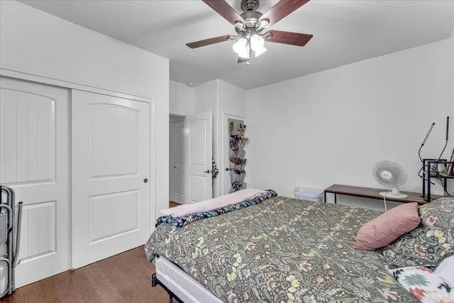 a view of a patio with a table and chairs