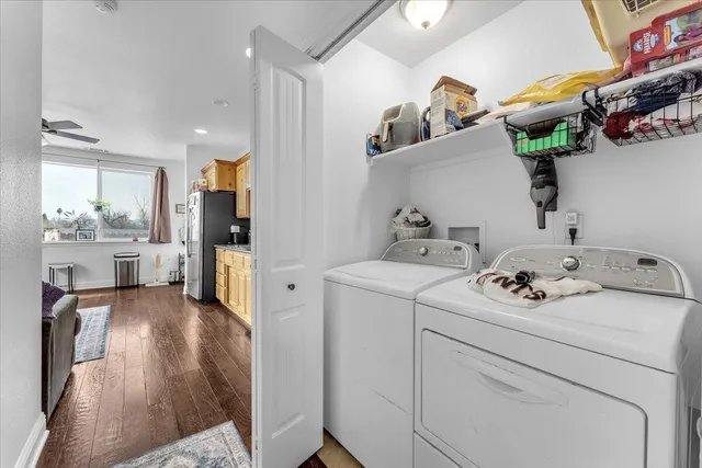 a building outdoor space with patio furniture and potted plants