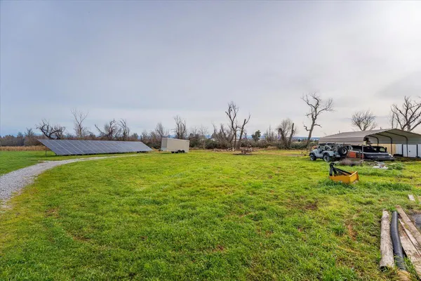 a view of a backyard with a tub