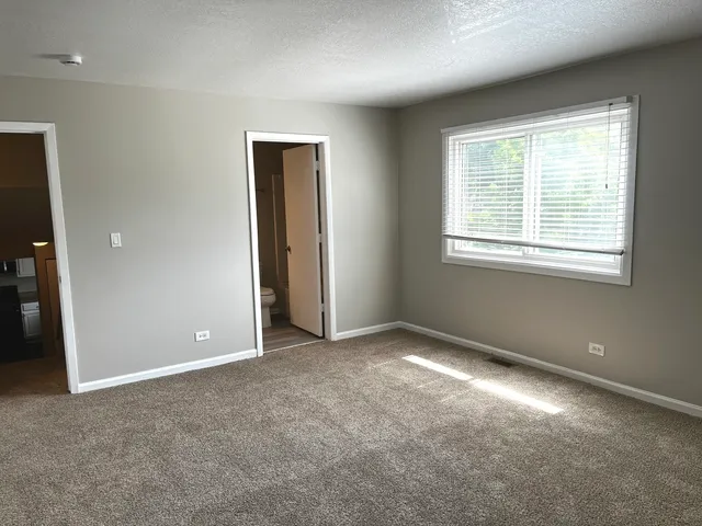a kitchen with a stove and a microwave