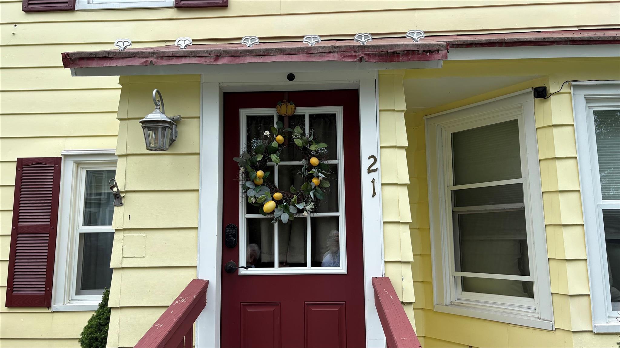 21 Mitchell Avenue Callicoon, NY 12723 - Photo 2 of 33 View of exterior entry featuring a porch
