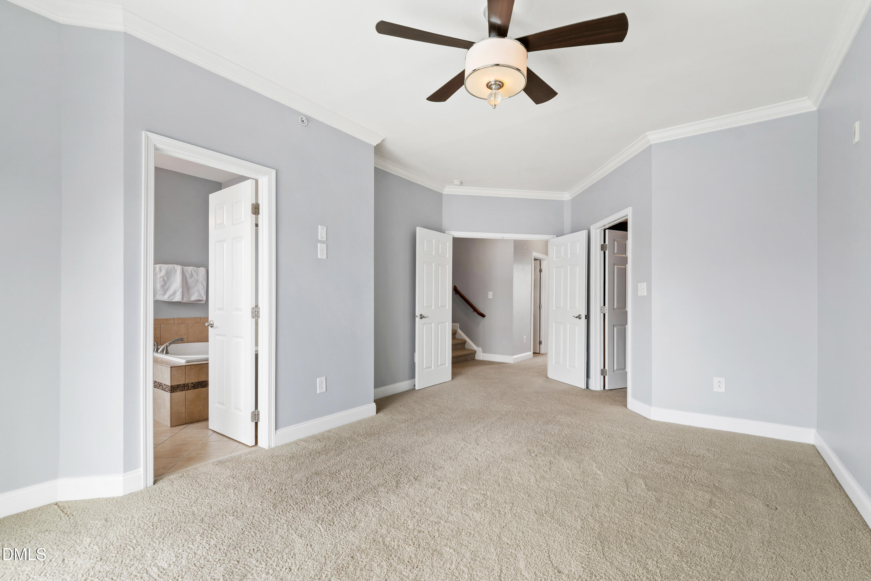 10321 Sablewood Drive, Unit 108 Raleigh, NC 27617 - Photo 18 of 41 a view of empty room with a ceiling fan