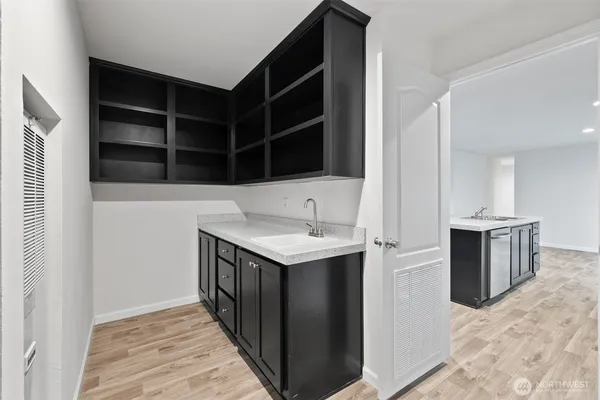 a hallway with cabinets