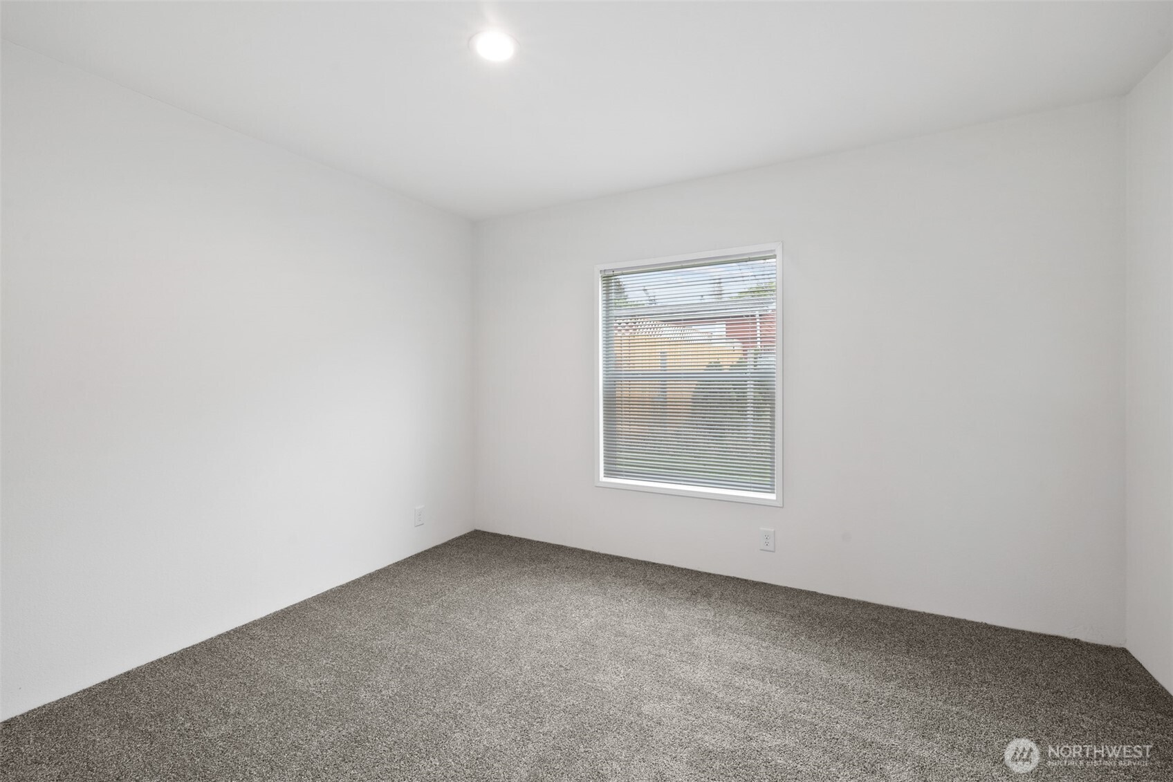 591 North Lees Creek Road Port Angeles, WA 98362 - Photo 25 of 39 an empty room with a window