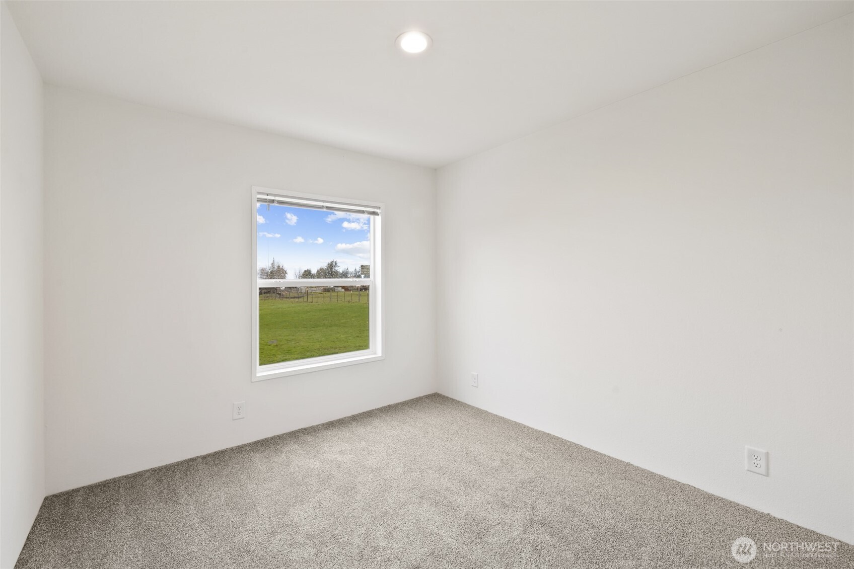 591 North Lees Creek Road Port Angeles, WA 98362 - Photo 27 of 39 a view of an empty room with a window
