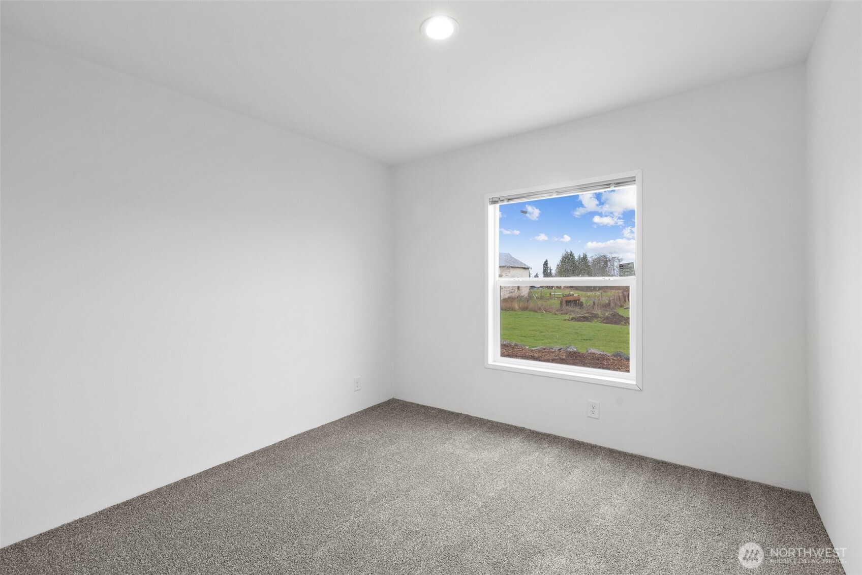 591 North Lees Creek Road Port Angeles, WA 98362 - Photo 29 of 39 an empty room with windows