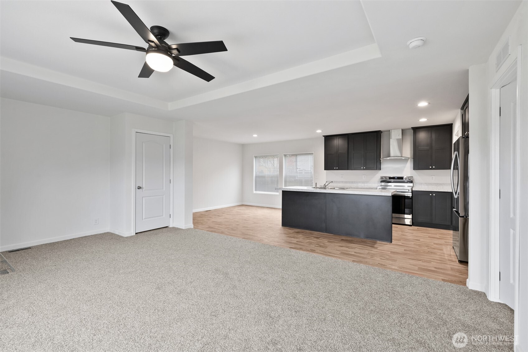 591 North Lees Creek Road Port Angeles, WA 98362 - Photo 3 of 39 a view of kitchen with sink microwave and refrigerator